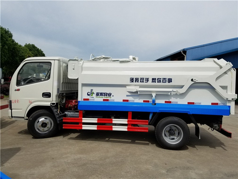 東風5方側裝壓縮垃圾車(對接壓縮垃圾車)